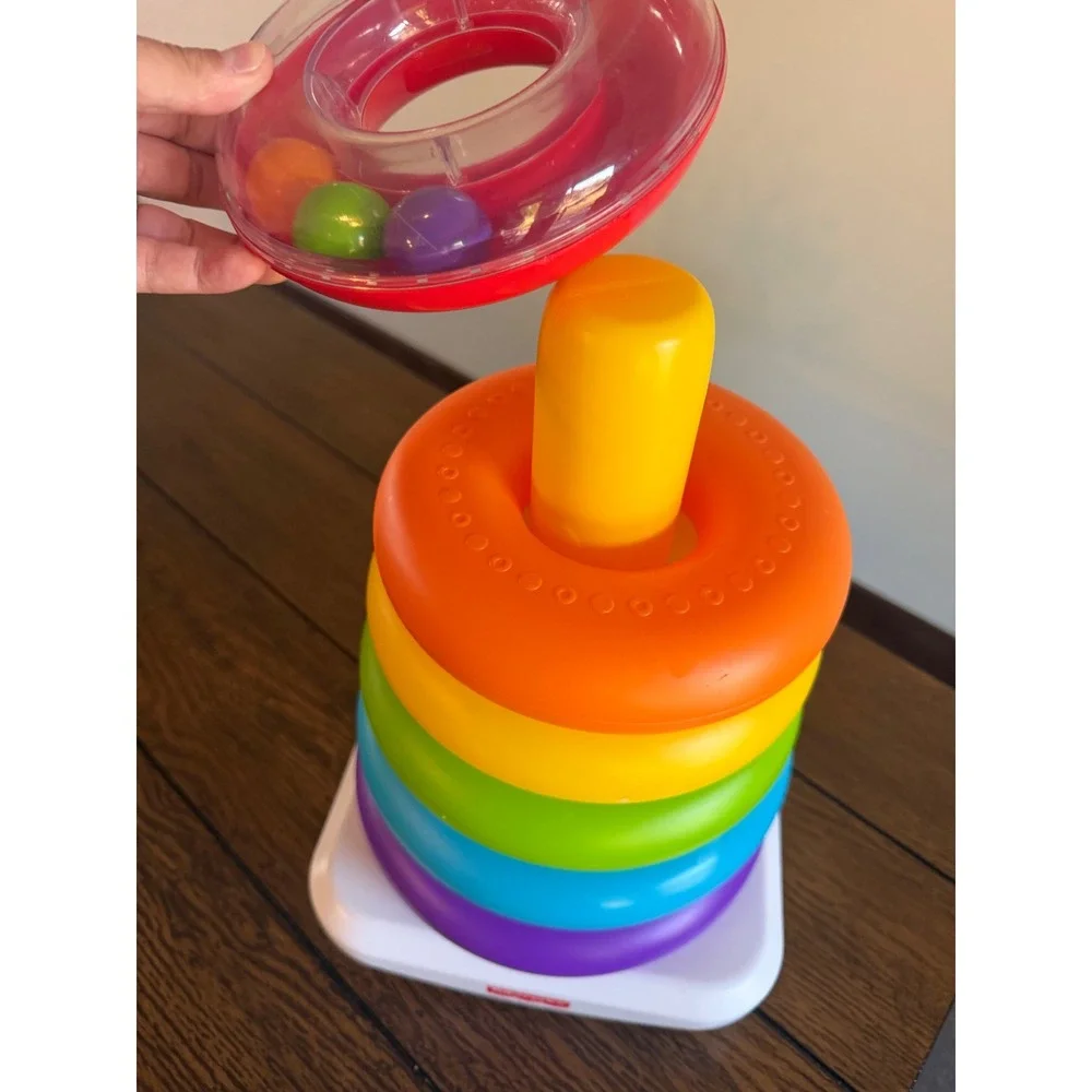 Fisher-Price Rock-a-Stack Rainbow Ring Stacker Baby Toy with Rattle Beads